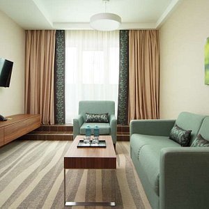 Hotel Moscow Krasnoselskaya in Moscow, image may contain: Living Room, Couch, Interior Design, Coffee Table
