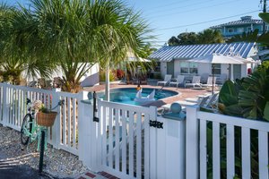 The Bungalows in Treasure Island, image may contain: Yard, Nature, Outdoors, Backyard