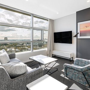 Meriton Suites Zetland in Sydney, image may contain: Penthouse, Living Room, Couch, Monitor