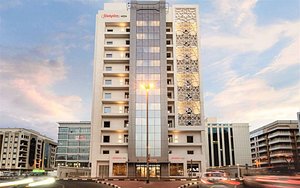Hampton By Hilton Dubai Al Barsha in Dubai, image may contain: City, Urban, High Rise, Condo