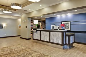 Hampton Inn & Suites by Hilton Saskatoon Airport in Saskatoon, image may contain: Indoors, Table, Shop, Floor