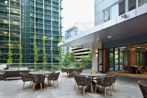 The Porter Portland, Curio Collection By Hilton in Portland, image may contain: City, Terrace, Urban, Chair