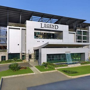 Legend Hotel Lagos Airport, Curio Collection by Hilton in Lagos, image may contain: Office Building, Villa, Grass, Convention Center