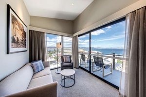 Vibe Hotel Hobart in Hobart, image may contain: Balcony, Penthouse, Couch, Living Room