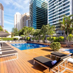 Royal on the Park Hotel outdoor pool and spa. Bar and restaurant service with a poolside bar in the Summer
