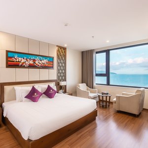 Rosamia Da Nang Hotel in Da Nang, image may contain: Penthouse, Hotel, Resort, Chair
