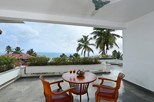 Getaway Beach Resort Kovalam in Kovalam, image may contain: Balcony, Resort, Chair, Table