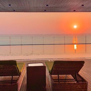 Rosamia Da Nang Hotel in Da Nang, image may contain: Penthouse, Hotel, Resort, Chair