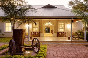 Pioneers Lodge in Victoria Falls, image may contain: Villa, Shelter, Porch, Spoke