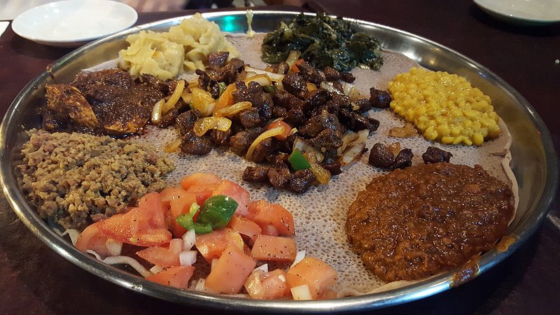 A meat and vegetable combination plate at Dukem Restaurant
