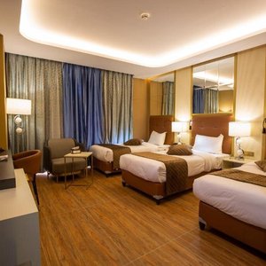 Petra Moon Luxury Hotel in Petra - Wadi Musa, image may contain: City, Condo, Urban, High Rise