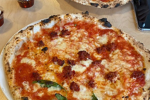 https://dynamic-media-cdn.tripadvisor.com/media/photo-o/26/f0/aa/69/rudy-s-pizza-napoletana.jpg?w=600&h=400&s=1