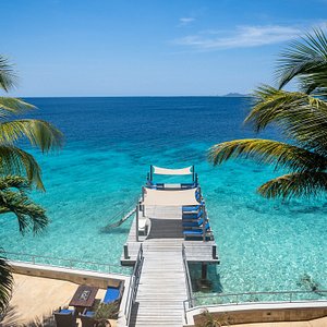 The view from your room at the crystal clear ocean. Are you ready to dive in?
