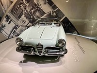 File:15 - ITALY - Parked automobiles out of Museo Storico Alfa Romeo Milan  - in this pics Alfa Romeo Giulietta black hatchback tuning with  Bicycles.jpg - Wikimedia Commons