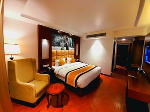 Hotel Royal Savoy Kashmir in Srinagar, image may contain: Lighting, Monitor, Screen, Chair