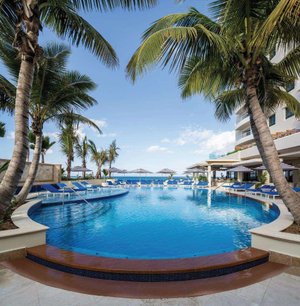 Pool main pool looking from spa with palm trees SJvzulFDfrvRixNqUNXo cmyk l