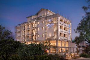 INFINITEA CENTRIC DHARAMSHALA in Dharamsala, image may contain: Hotel, Condo, City, Apartment Building