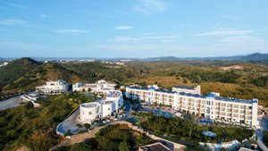 Ramee Royal Resorts & Spa Udaipur in Lai, image may contain: Resort, Hotel, Building, City