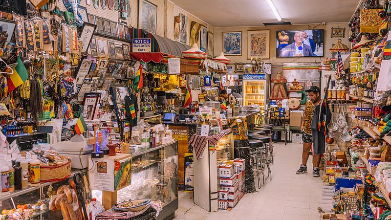 A customer takes in the overwhelming amount of merchandise inside Merkato