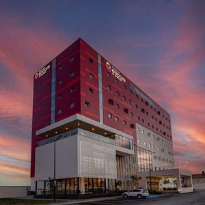 Ramada Encore By Wyndham Guadalajara Aeropuerto in Guadalajara, image may contain: Office Building, City, Hotel, Condo