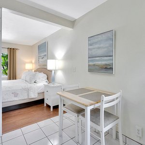 Seahorse Guesthouse in Pompano Beach, image may contain: Hotel, Resort, Villa, Chair
