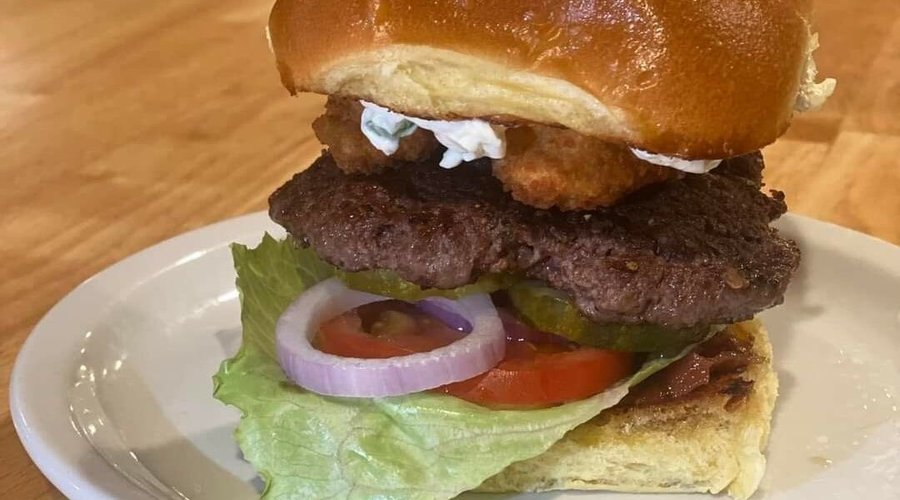 Jalapeno popper burger, it is occasionally a special, but you can have it anytime! Just ask our wonderful servers!
