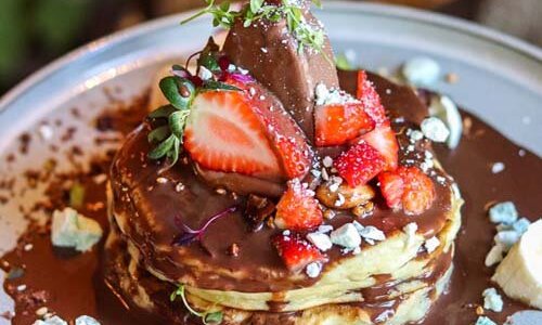 Pancakes Choco Loco with Nutella & cheese cream, chocolate ganache sauce, ice cream & fresh fruits
