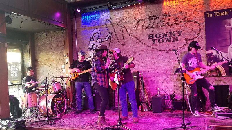 Band performing at Nudies Honky Tonk