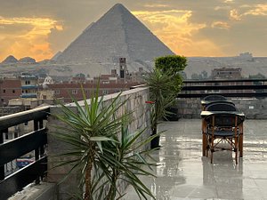 Kemet Boutique Hotel in Giza, image may contain: Plant, Pyramid, Building, Architecture