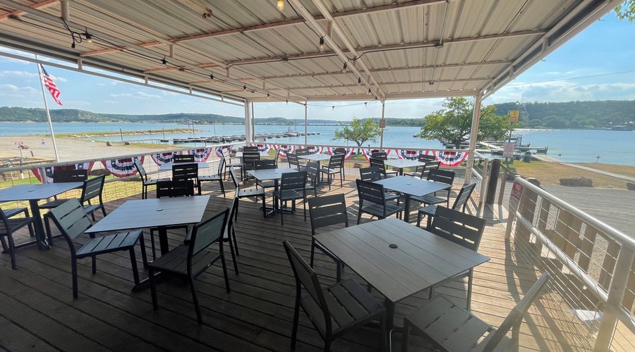 Outdoor dining deck at Fox Hollow Resort.