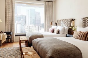 Downtown Los Angeles Proper in Los Angeles, image may contain: Home Decor, Dorm Room, Bed, Furniture