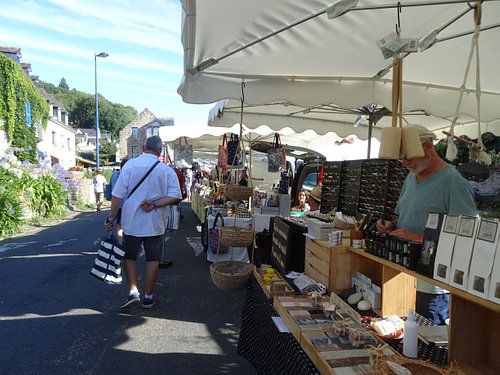 Fruit Stall With People Buying At Morlaix Weekly Market France