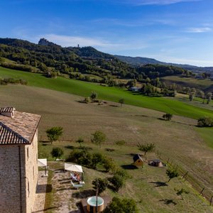 A drone view of palazzo serre, hot tube and amazing panorama of san leo and valmarecchia.