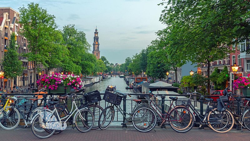 Bicycles on a bridge over Prinsengracht Canal in Amsterdam