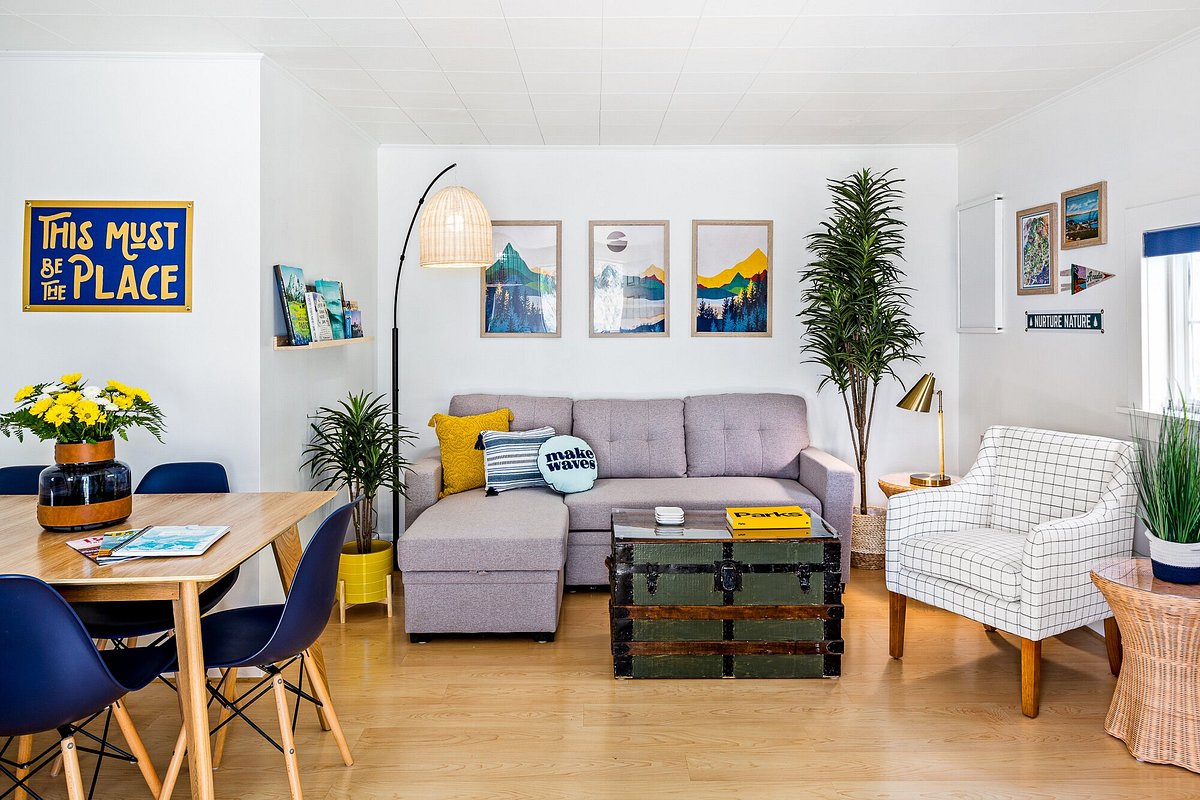 Plaid Couches in this Cozy Living Room (Interior Design by Surroundings  Home; Photography by Greg Premr…