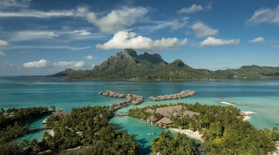 Four Seasons Resort Bora Bora - a luxurious private island experience with the destination's best views of majestic Mount Otemanu.