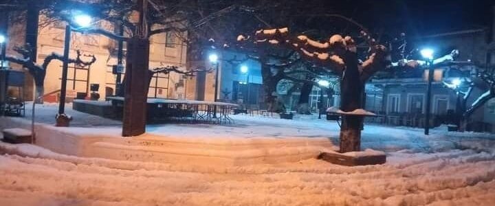 The central square in Politika - a picturesque and traditional village in central Evia - during snowfall.