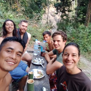 Trekking group enjoying dinner at the campsite