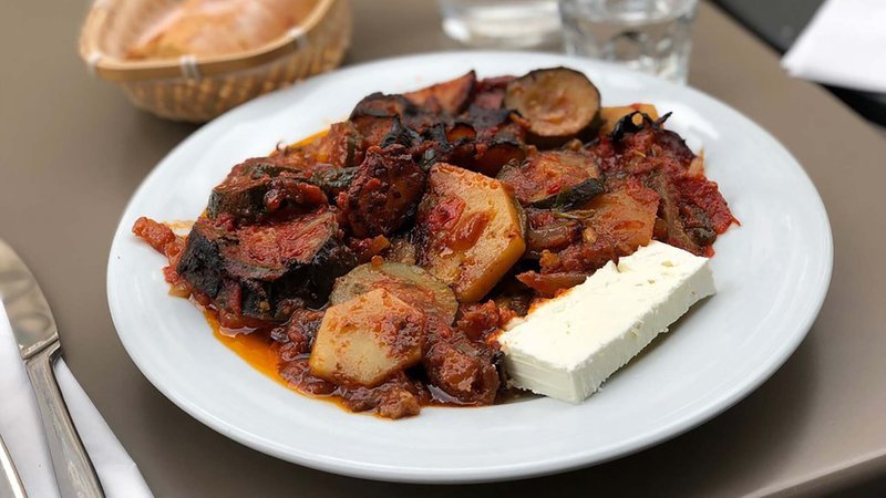 Plate of stewed vegetables and feta at Tzeferakos 