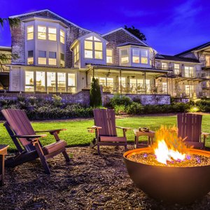 Nighttime View of Jubilee Suites overlooking Mobile Bay.  Fire pit lighted nightly.