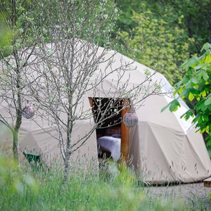 The Drey Geodesic dome, one of our 2 domes hand crafted oak frame with a canvas cover and panoramic window.
 Our domes have a log burner for the cooler evenings, king size bed and 2 singles all supplied with fresh linen and towels to use in the hot showers.
 Gather around the camp fire in the evenings and prep your hot chocolate in the fully equipt outdoor kitchen.
 Each unit has its own outdoor wooden compost toilet.