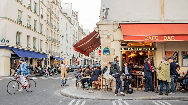 People outside a cafe in Saint-Germain des Pres, Paris 