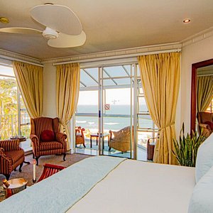 This suite offers full ocean view from the private balcony.  The room also has a full shower and spa bath.  