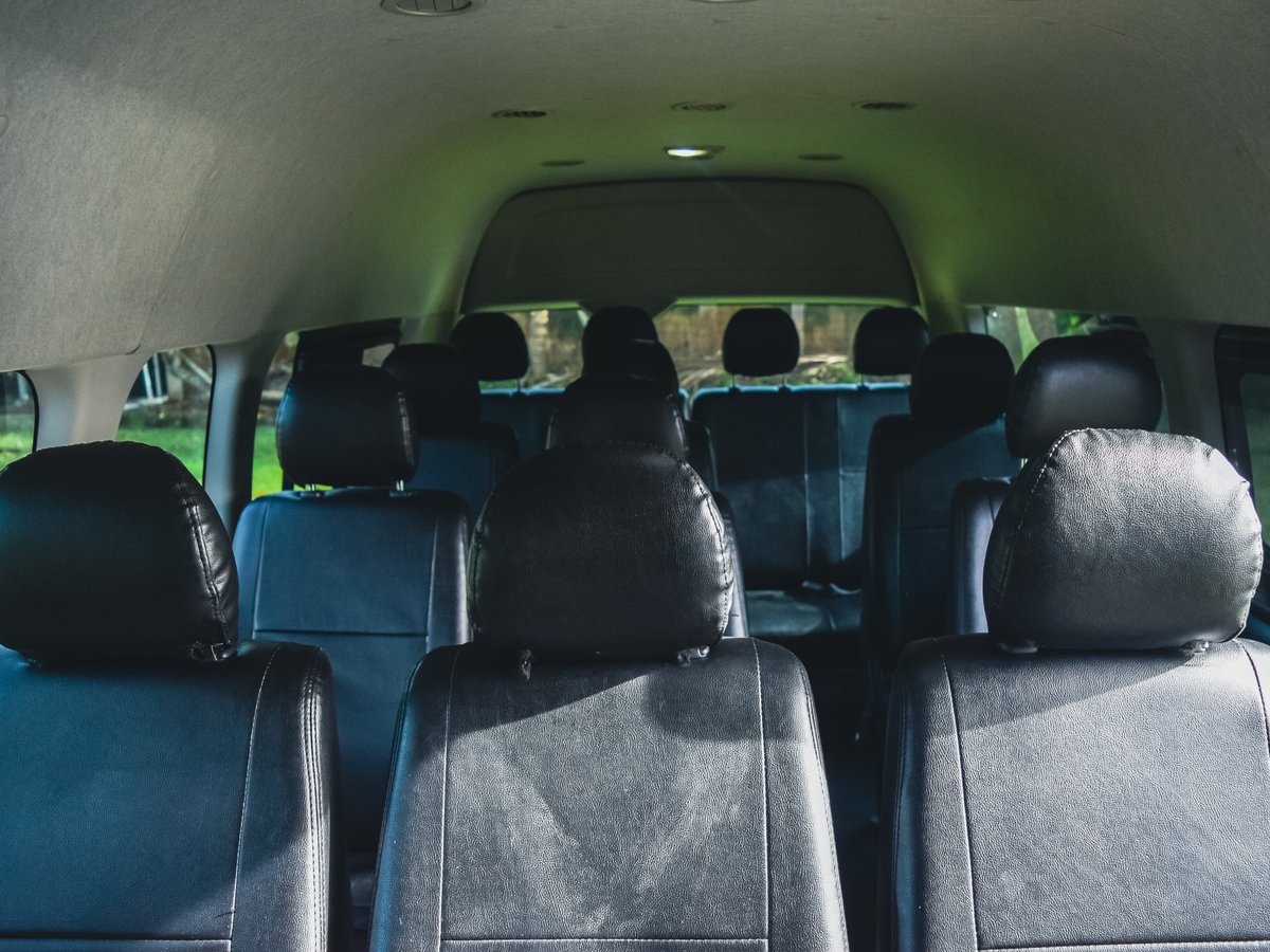 buse with plenty of legroom, air-conditioning, and comfortable seating for everyone.