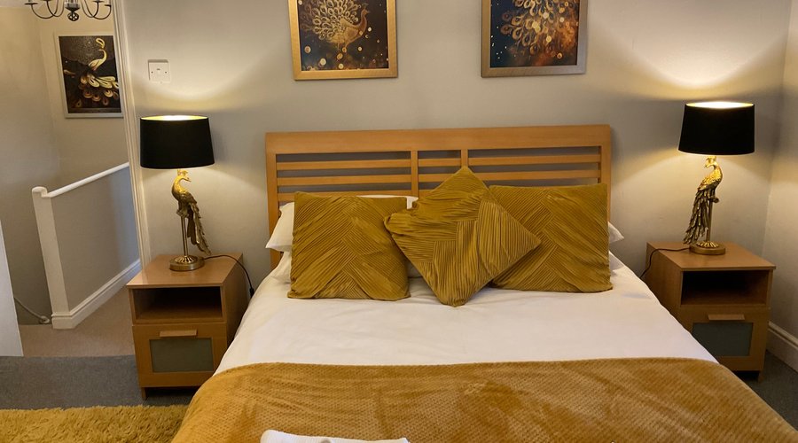 The Amber Suite. Bedroom, Sitting Room, Bathroom and Kitchenette