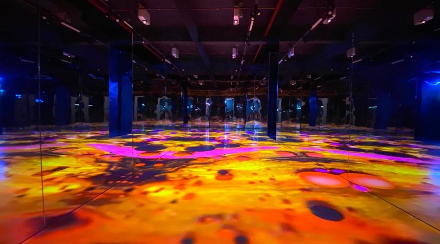 Walk along colorful tides as you take the first step at the Welcome Wave
