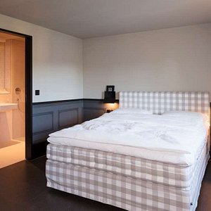 Boutique Hotel Helvetia in Zurich, image may contain: Lamp, Bed, Furniture, Interior Design