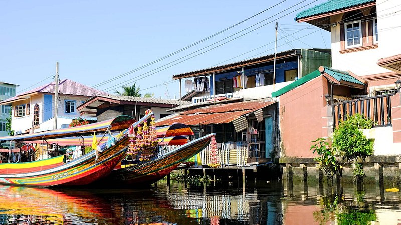 Boats on canal in Thonburi, Bangkok, Thailand 