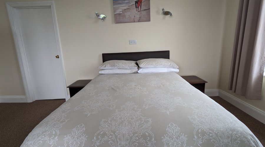 Second floor, corner aspect, Superior, spacious family room with full en suite bathroom.  uninterrupted panoramic views of the Solway and Scotland.  Often let as Double or twin room. 