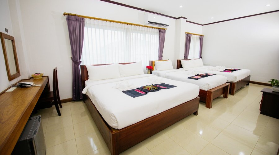The Standard Family Room is another great option for families or groups of travelers who want to stay together. 

The room features two double or single beds, a city view, and two private bathrooms with a shower.

This room category offers a comfortable and convenient stay for families or groups of travelers.